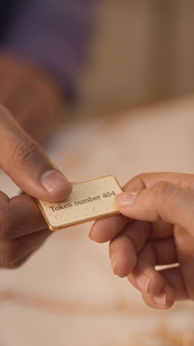 Token being handed over at a service counter